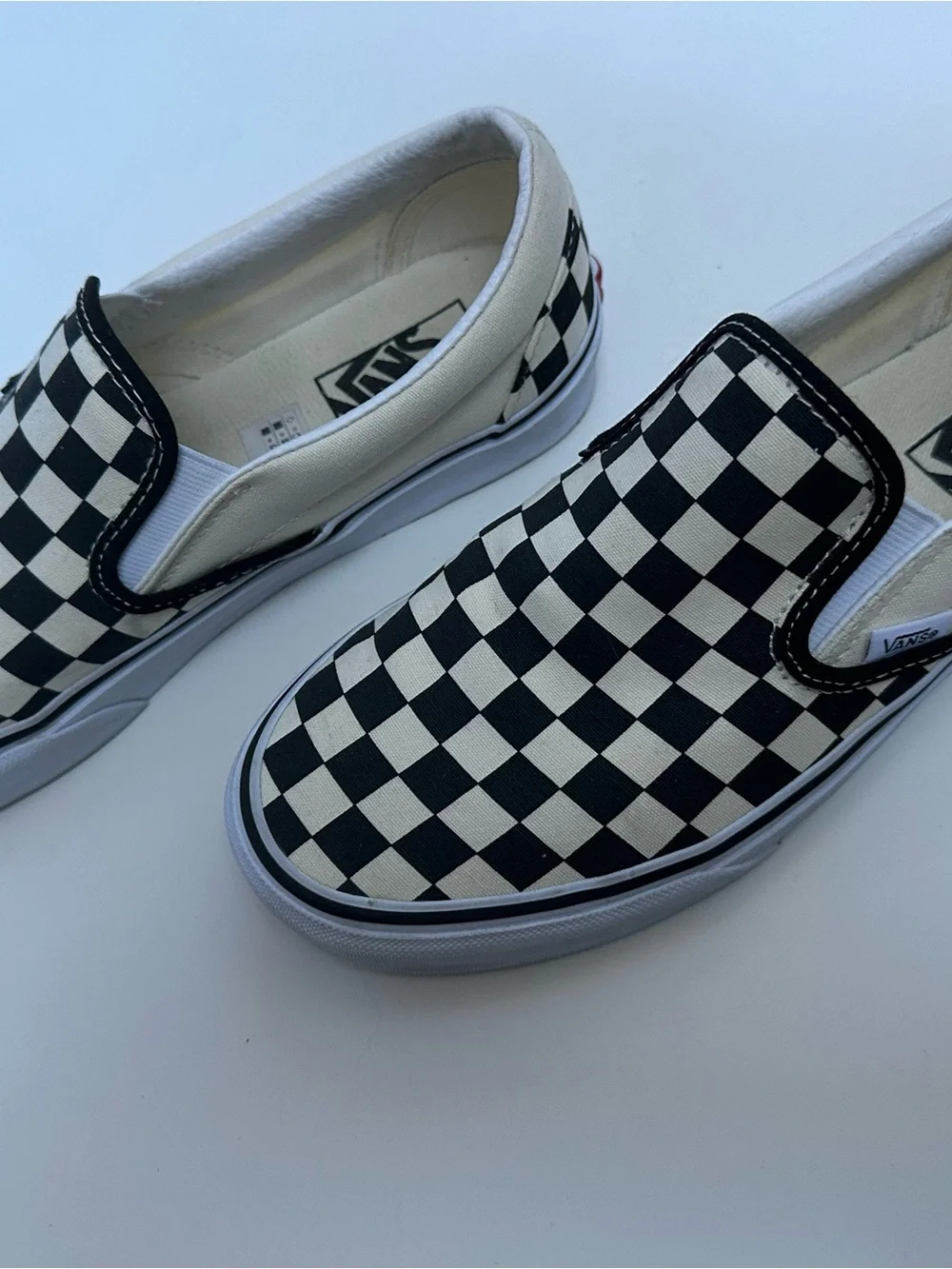 Vans Women’s Checkerboard Slip-On Sneakers - Black & White